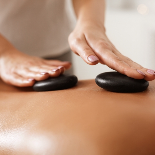 Hot-stones-Massage-massage-therapy-image-Zenith-Physiotherapy-and-wellness-Airdrie-AB